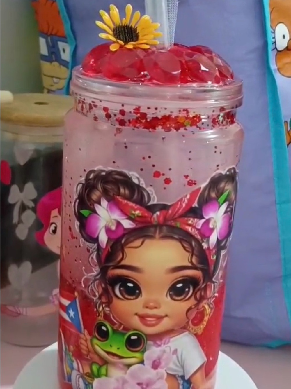 Children's water bottle with floral and character designs